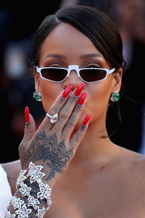 Rihanna hand gesture. Things To Know About Rihanna hand gesture. 